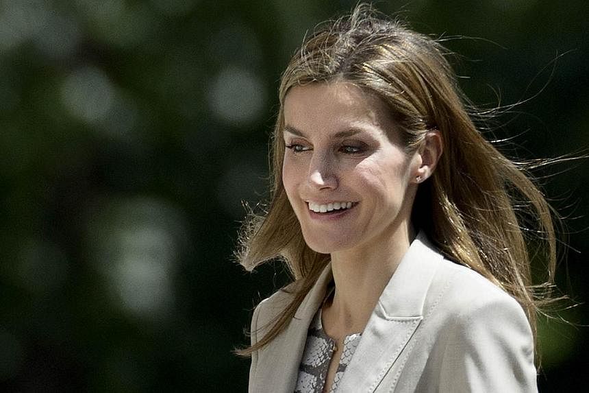 Spain's Princess Letizia arrives at the inauguration of the exhibition El Ultimo Viaje de la Fragata Mercedes (The Last Voyage Of Tthe Frigate Mercedes) at the Naval museum in Madrid on June 12, 2014. -- PHOTO: AFP