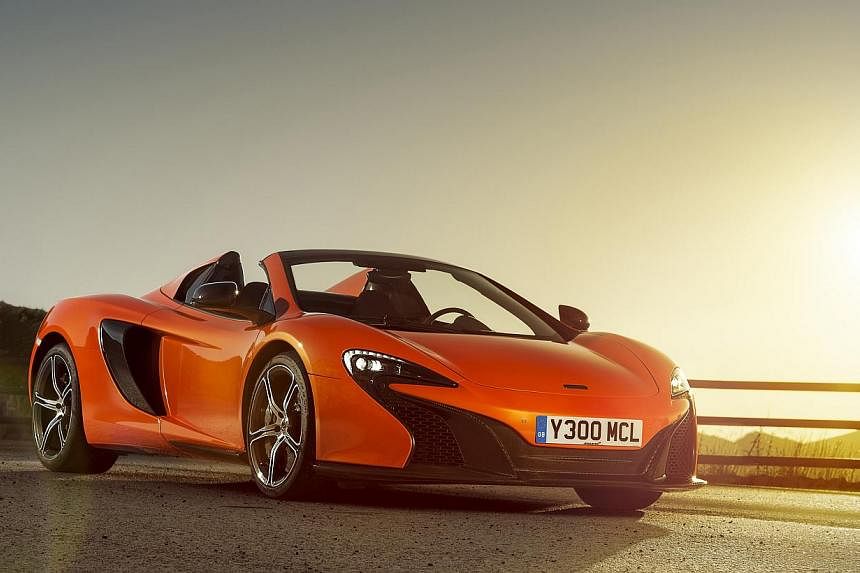 A McLaren 650S Spider similar to the one above was involved in the accident. There are only about 60 McLaren vehicles on the road here. The driver of the tipper truck (above) was injured in the head but the occupants of the car were unhurt. It is und