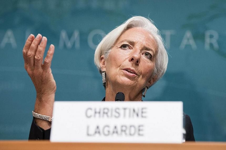 IMF Managing Director Christine Lagarde speaks at the International Monetary Fund's headquarters on June 16, 2014 in Washington, DC. -- PHOTO: AFP