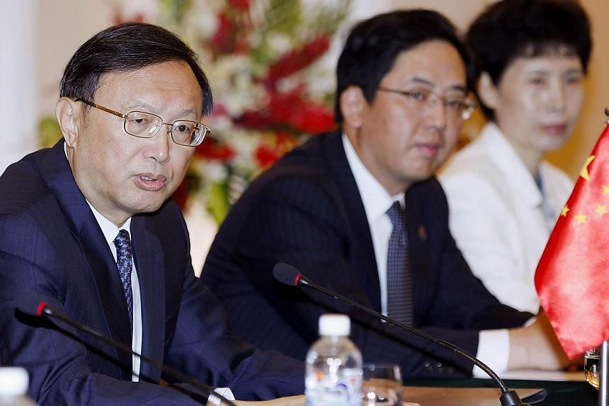 Chinese diplomat Yang Jiechi (left) speaks during a meeting with Vietnam's Foreign Minister Pham Binh Minh (not pictured) at the government's guesthouse in Hanoi on June 18, 2014. -- PHOTO: AFP