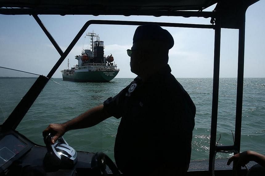 A Japanese oil tanker which was raided by armed pirates sailing in Port Klang, outside Kuala Lumpur, in April. In responding to piracy, the focus should not only be on the diplomatic and naval steps, but also on legal, economic and social factors.