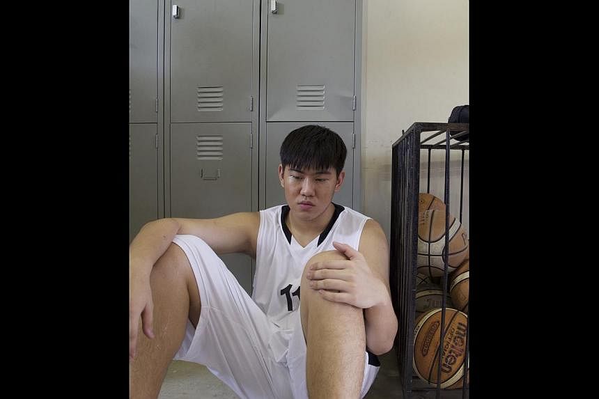 Actor-turned-director Tay Ping Hui fielded a team of newbie actors in Meeting The Giant, most of whom are taller than him. Three of them, including Delvin Goh (above) are from Singapore’s professional basketball team, Singapore Slingers. -- PHOTO: 