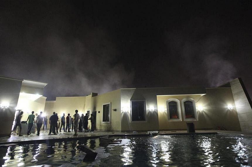 Damage at the US Consulate in Benghazi is seen during a protest by an armed group said to have been protesting a film being produced in the United States in this Sept 11, 2012 file photo. -- PHOTO: REUTERS
