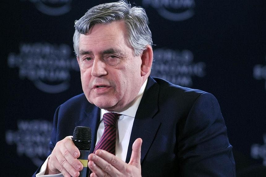 Former British Prime Minister and UN education envoy Gordon Brown speaks about "Safe Schools Initiative" at the World Economic Forum in Abuja on May 7, 2014. -- PHOTO: AFP