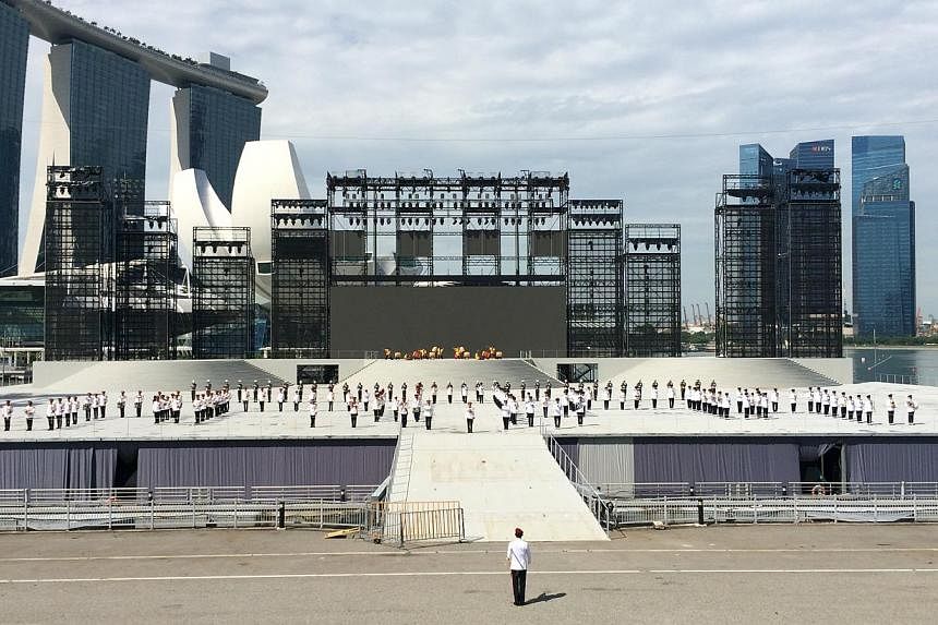 The parade and ceremony segment of this year's NDP will start with a seven-minute-long display by the Combined Band and SAF Precision Drill Squad. -- ST PHOTO: LEE JIAN XUAN