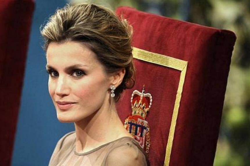 Princess Letizia of Spain attending the 2011 Prince of Asturias awards ceremony at the Campoamor Theater, in Oviedo on Oct 21, 2011. Princess Letizia will break the mould of the classic royal when she is crowned queen of Spain. -- PHOTO: AFP
