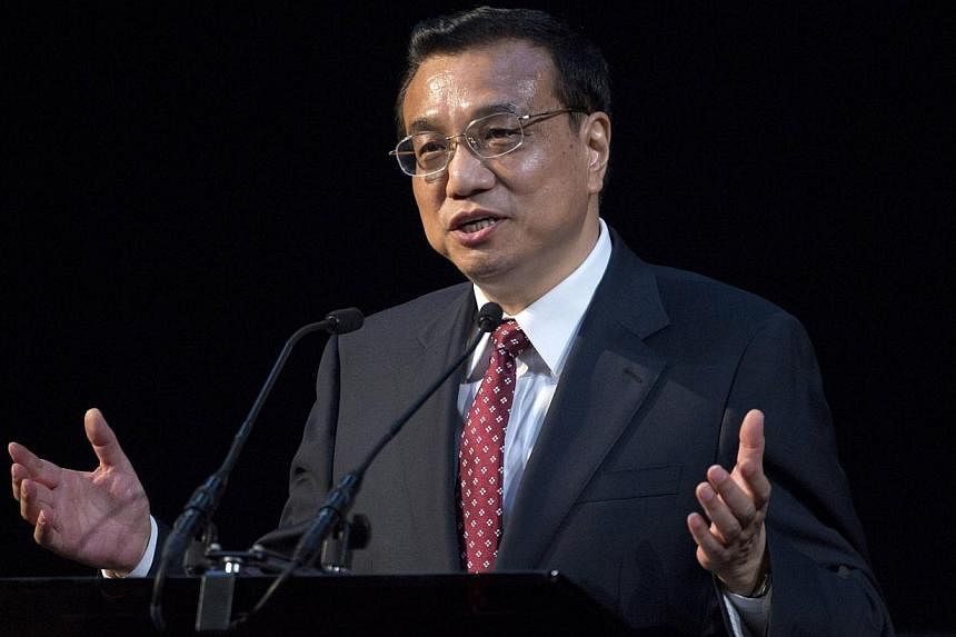 Chinese Premier Li Keqiang delivers a speech at a China-Britain Business Council dinner in London on June 17, 2014.&nbsp;Chinese Premier Li Keqiang said Tuesday he wanted to see a “united” Britain, as Scotland prepares to vote on independence. --