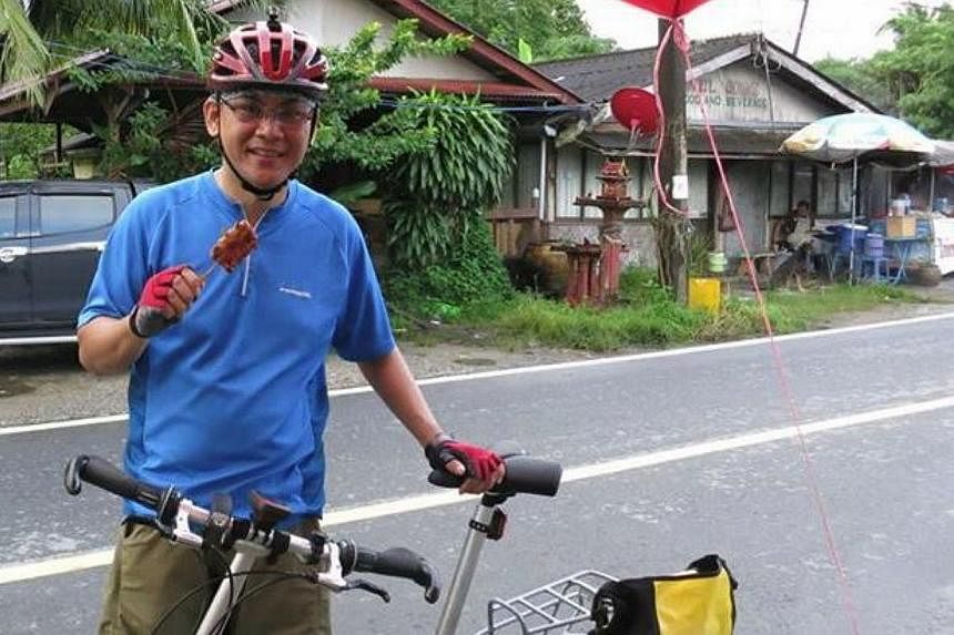 Mr Arthur Yap, 48, was killed on Sunday when his bicycle collided with a bus near Johor's Legoland theme park. -- PHOTO:&nbsp;ARTHUR YAP/FACEBOOK