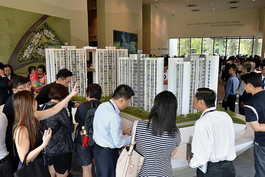 Potential buyers at the showroom of Panorama condominium. -- PHOTO: WHEELOCK PROPERTIES (SINGAPORE)