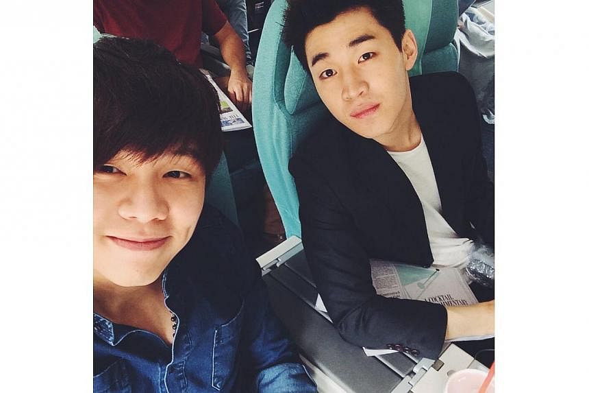 Singaporean songwriter Gen Neo (left) and Henry Lau of K-pop group Super Junior-M. Mr Neo has been based in Seoul for the past one-and-a-half years and written tunes for Super Junior-M and f(x).&nbsp;-- PHOTO: GEN NEO