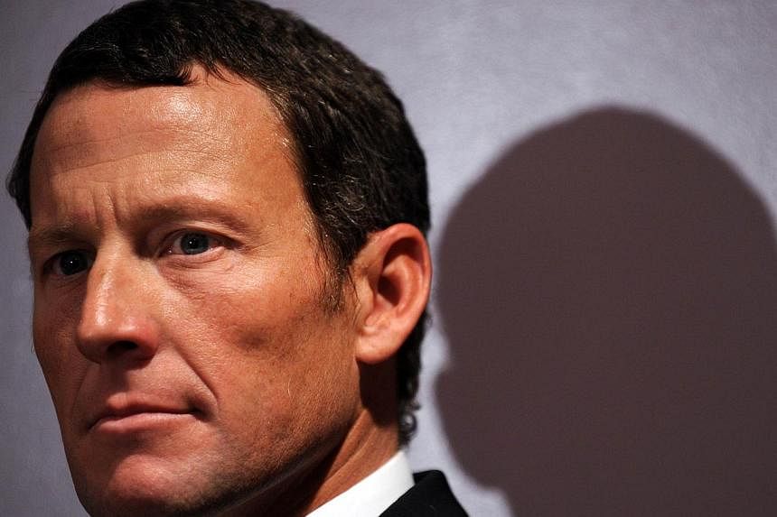 A picture taken on Feb 28, 2011 shows US cyclist Lance Armstrong attending a press conference in Los Angeles. -- PHOTO: AFP