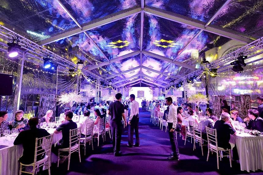 A Midsummer’s Night Feast (above), a themed dining event, held recently in Clarke Quay. -- PHOTO: CLARKE QUAY