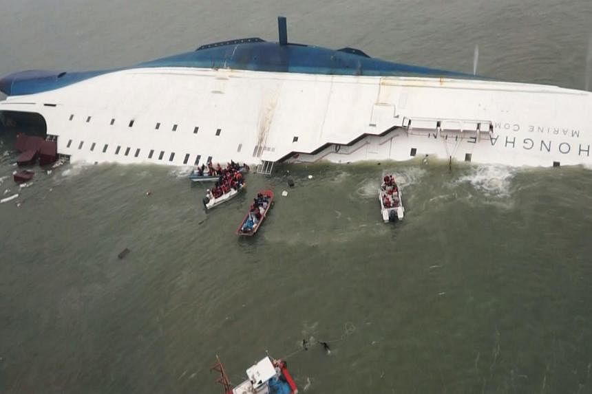 South Korean ferry, Sewol is seen sinking in the sea off Jindo on April 16, 2014. -- PHOTO: REUTERS