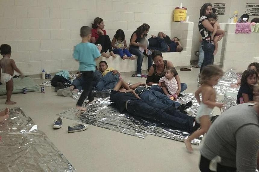 Illegal immigrants are seen at a US Department of Health and Human Services facility in South Texas in this handout photo courtesy of the office of US Representative Henry Cuellar (D-TX) taken within last two weeks and released on June 12, 2014. -- P