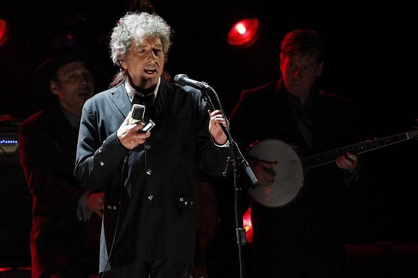 Singer Bob Dylan performs during a segment honoring Director Martin Scorsese, recipient of the Music+ Film Award, at the 17th Annual Critics' Choice Movie Awards in Los Angeles on Jan 12, 2012. -- PHOTO: REUTERS