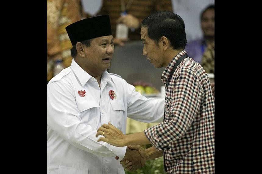 Indonesian presidential candidates Prabowo Subianto (left) and Joko "Jokowi" Widodo. The new president will have a grand opportunity to take a fresh stand on human rights issues.