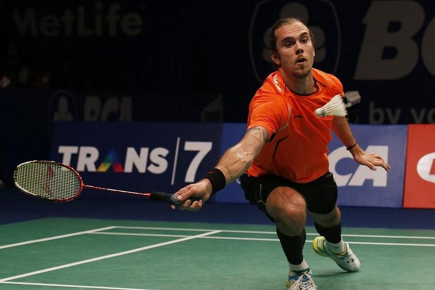 Denmark's Jan O Jorgensen returns a shoot to Japan's Kenichi Tago (not pictured) during their men's single final match at the BCA Indonesia Superseries Open badminton championship in Jakarta on June 22, 2014. Jorgensen won his first Indonesia Open ba