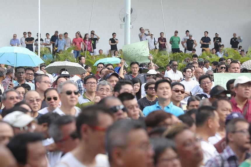 Crowd at the “Return Our CPF” protest at Hong Lim Park on June 7, 2014. -- ST PHOTO: ONG WEE JIN