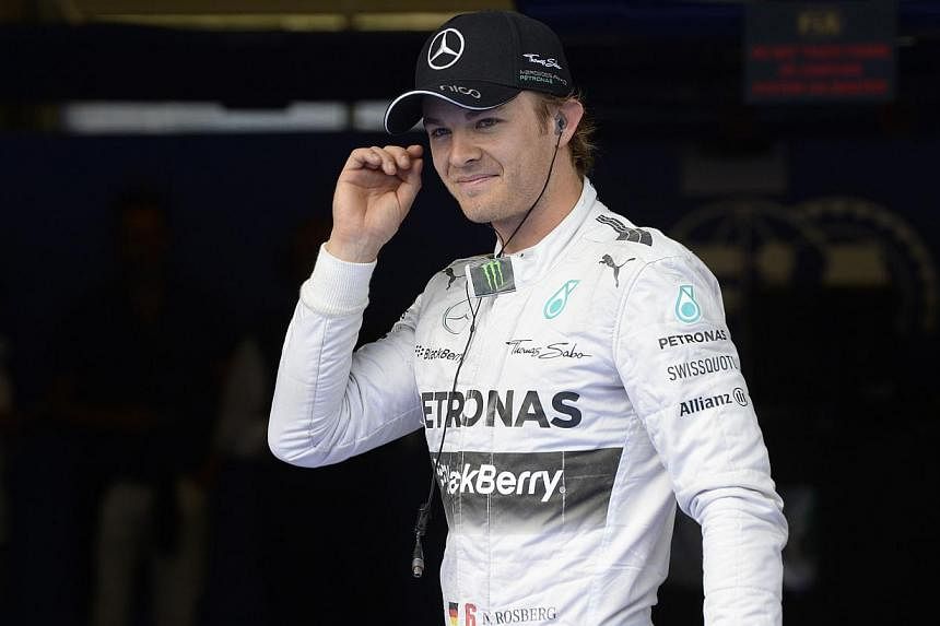 Mercedes' German driver Nico Rosberg reacts after placing third in the qualifying session at the Austrian Formula One Grand Prix at the Red Bull Ring in Spielberg, Austria on June 21, 2014. -- PHOTO: AFP