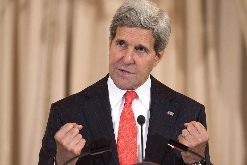 United States Secretary of State John Kerry arrived in Egypt on June 22, 2014, on a surprise trip, becoming the highest-ranking US official to visit since President Abdel Fattah al-Sisi came to power. -- PHOTO: AFP&nbsp;