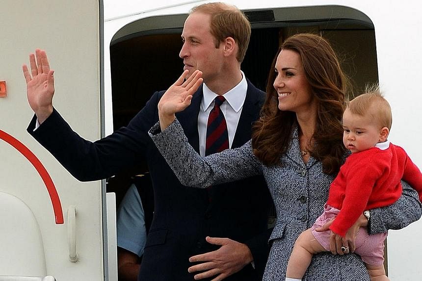 Britain's Prince William (left), his wife Catherine and their son Prince George depart Australia from Defence Establishment Fairbairn in Canberra on April 25, 2014.&nbsp;The British monarchy has defended the cost of refurbishing a Kensington Palace a
