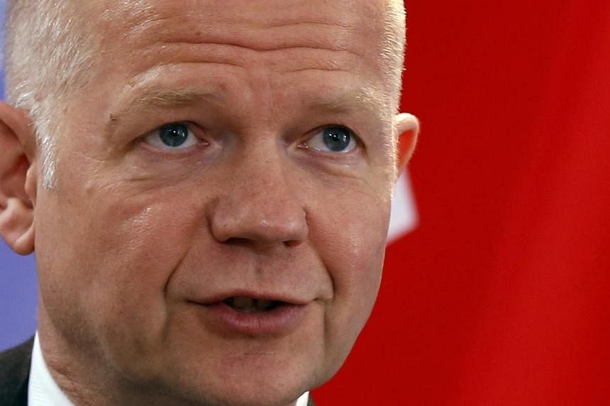 British Foreign Secretary William Hague says "a lot of&nbsp;work" has gone into preparing wider sanctions on Russia. PHOTO: REUTERS