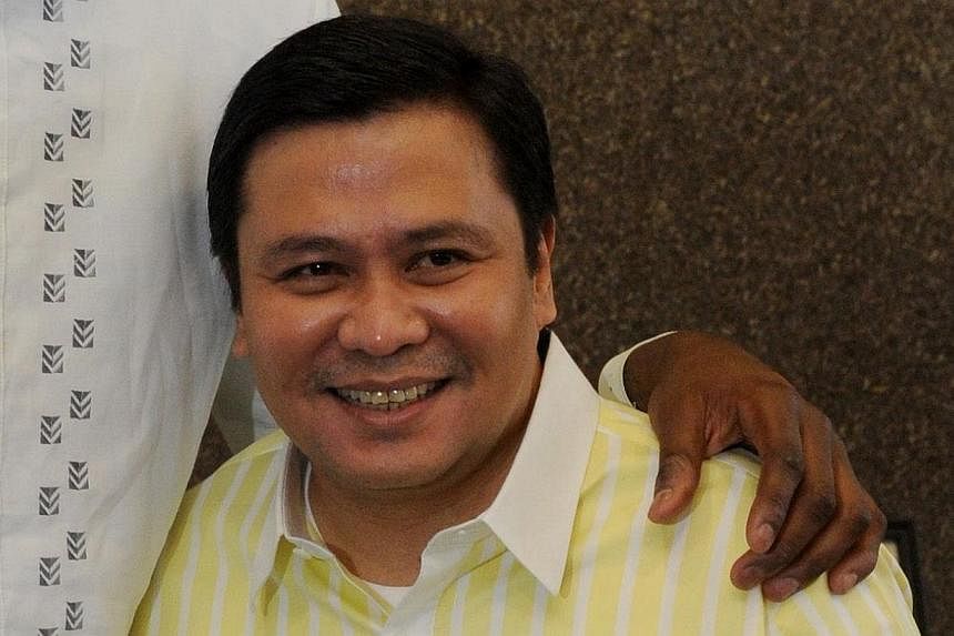 Jose "Jinggoy" Estrada, son of former Philippines president Joseph Estrada, on Monday turned himself over to police to face charges he received millions worth of kickbacks in a massive corruption scandal that has riveted the nation. -- PHOTO: AFP&nbs