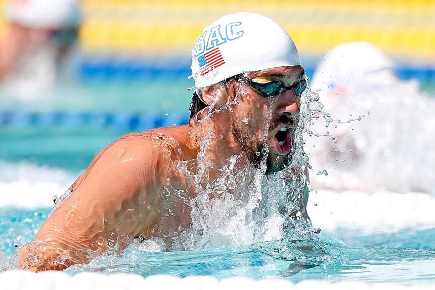 Michael Phelps during the Men's 200IM during the preliminary heats at the George F. Haines International Aquatic Center. -- PHOTO: REUTERS / USA TODAY SPORTS