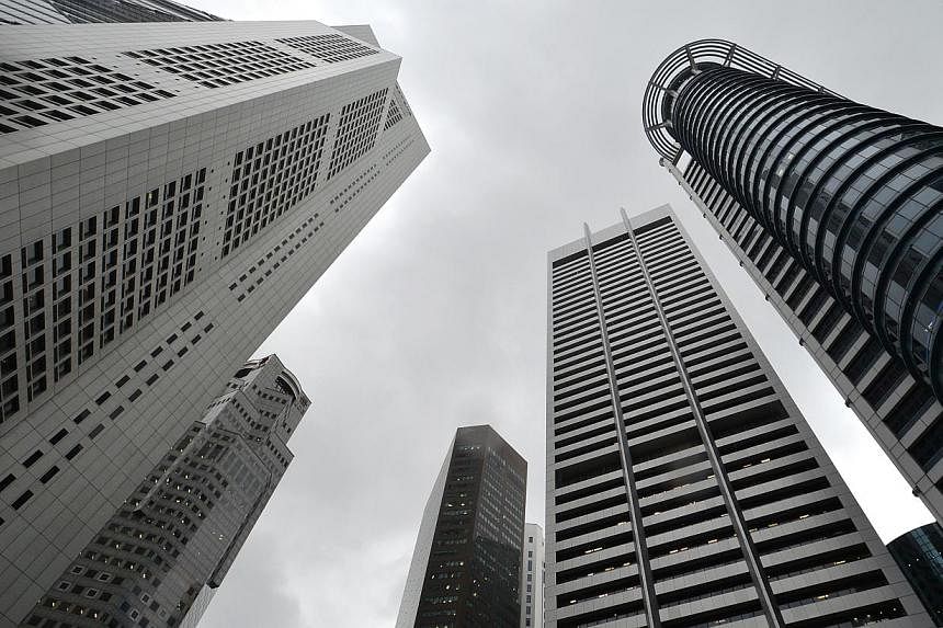 Office rents in the central business district (CBD) jumped in the second quarter this year and are likely to continue rising for the next 12 months due to limited supply, property consultancy JLL said. -- PHOTO: ST FILE