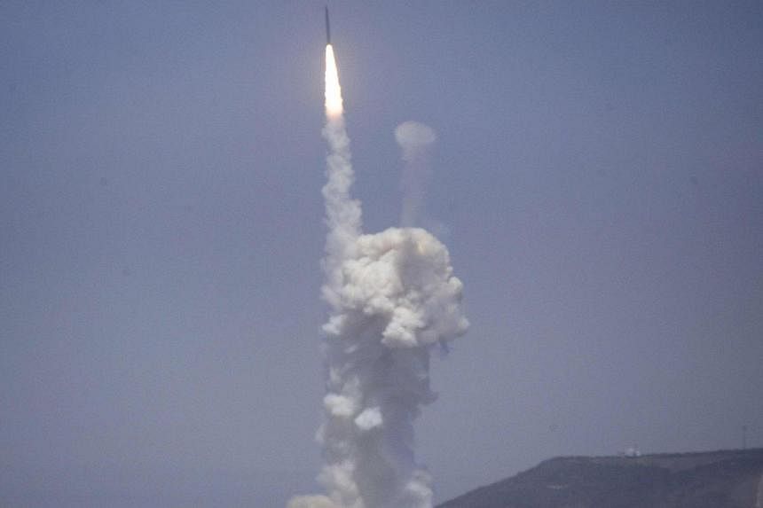 A flight test of the exercising elements of the Ground-Based Midcourse Defense system is launched by the 30th Space Wing and the US Missile Defense Agency at the Vandenberg AFB, California on June 22, 2014. -- PHOTO: REUTERS
