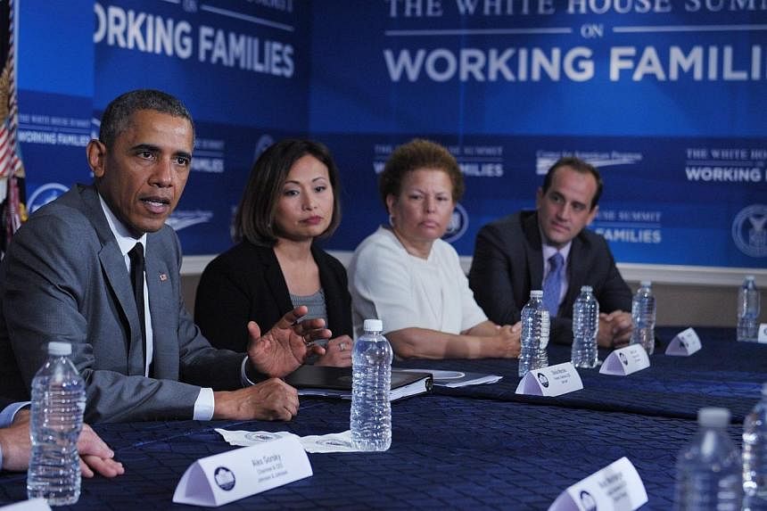 United States President Barack Obama takes part in a round table discussion during the White House Summit on Working Families on June 23, 2014, in Washington, DC.&nbsp;Mr Obama said on Monday that the United States was on its “lonesome” as the on