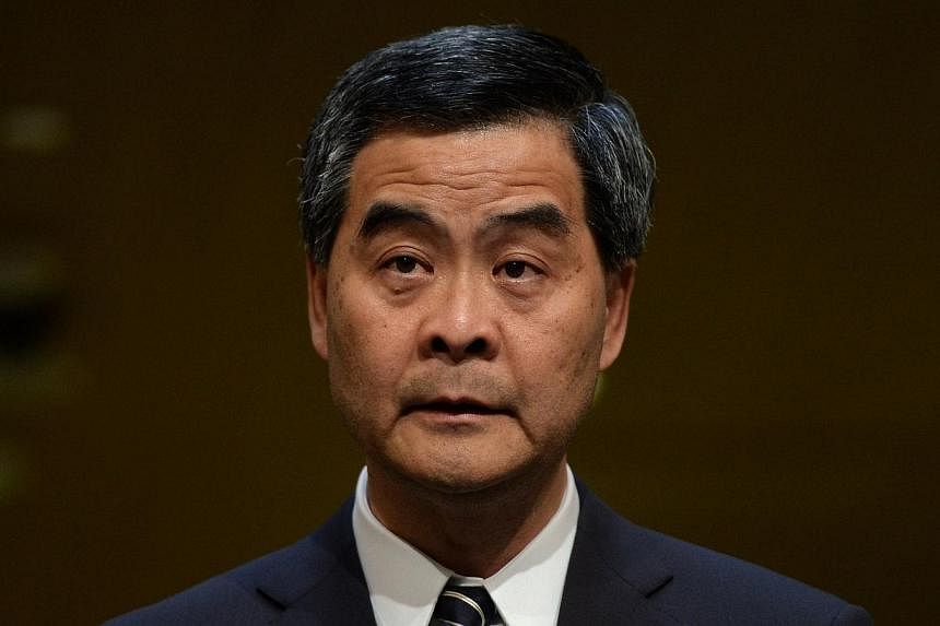 Hong Kong Chief Executive Leung Chun-ying speaks during a press conference in Hong Kong on April 23, 2014. Mr Leung on Tuesday hit back at Chinese media criticism of an unofficial democracy poll in the city, softening his previous stance on the ballo