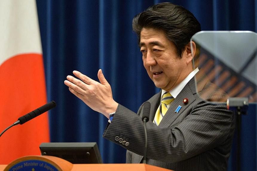 Japanese Prime Minister Shinzo Abe speaks during a press conference at his official residence in Tokyo on June 24, 2014, following the end of an ordinary Diet session.&nbsp;Philippine President Benigno Aquino, whose country was brutally invaded by Ja
