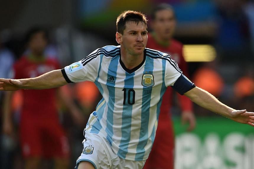 Lionel Messi turned 27 on Tuesday in the full spotlight of the World Cup, the Argentina superstar receiving birthday wishes from hordes of fans camped outside the team hotel. -- PHOTO: AFP