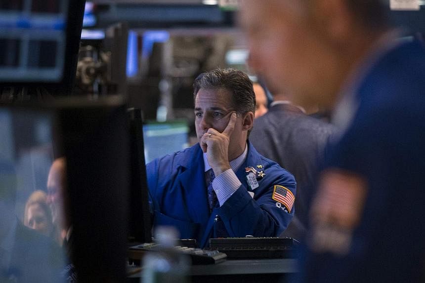 US stocks dropped on Tuesday despite solid economic data in a decline analysts attributed to profit taking and the ongoing Sunni insurgent attacks in Iraq. -- PHOTO: REUTERS