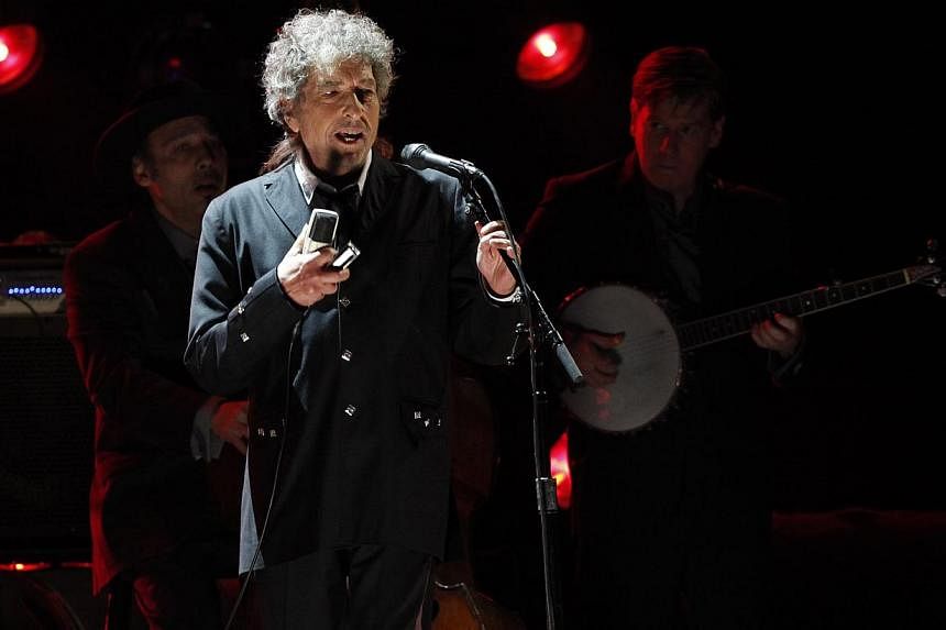 Singer Bob Dylan performs during a segment honouring Director Martin Scorsese, recipient of the Music+ Film Award, at the 17th Annual Critics' Choice Movie Awards in Los Angeles in this Jan 12, 2012, file photo. -- PHOTO: REUTERS