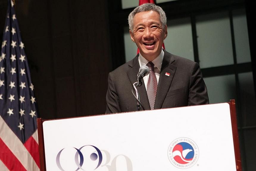 Singapore Prime Minister Lee Hsien Loong gives a speech during a reception to celebrate the 10th anniversary of US-Singapore FTA at the US Chamber of Commerce, in Washington DC, USA, on June 24, 2014. -- ST PHOTO: NEO XIAOBIN&nbsp;