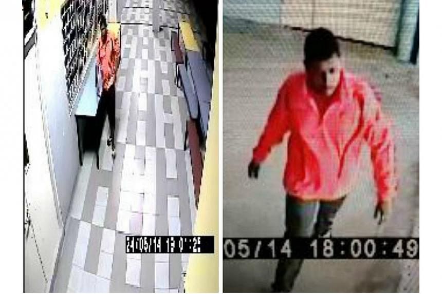 Police are looking for a man, pictured above, to assist with investigations into a case of housebreaking at Henderson Road on May 25.&nbsp;-- PHOTO: SINGAPORE POLICE FORCE&nbsp;
