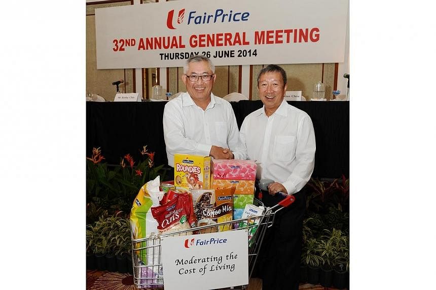 After almost nine years as chairman of NTUC FairPrice, Mr Ng Ser Miang (right) stepped down from his position on Thursday at the group's annual general meeting. Current board member Bobby Chin was subsequently elected as his successor..&nbsp;-- PHOTO