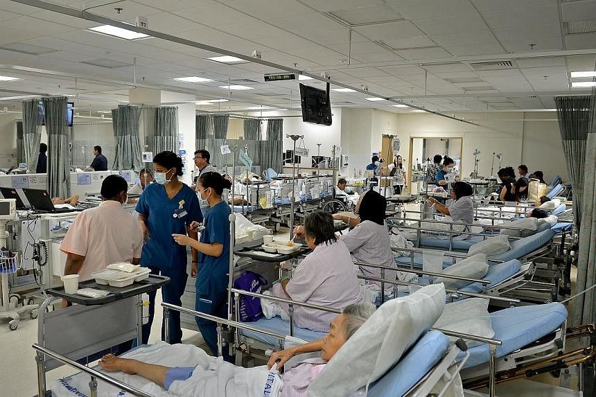 Patients waiting for a bed on 10 January 2014 at Khoo Teck Puat Hospital’s emergency department, which has 18 cubicles.&nbsp;The Alexandra Health System on Thursday became Singapore's first healthcare system to win a United Nations Public Service A