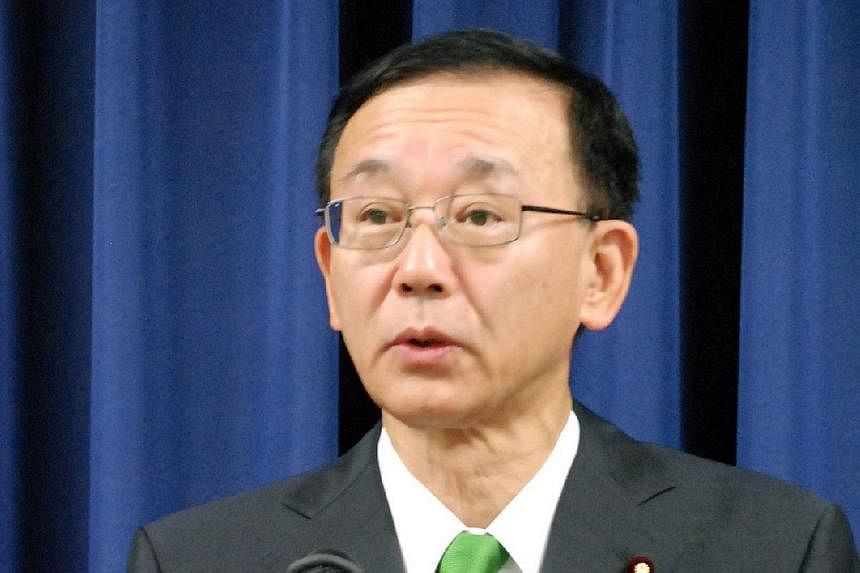 Japanese Justice Minister Sadakazu Tanigaki announcing that Japan hanged a man - the ninth prisoner executed since the conservative government of Prime Minister Shinzo Abe took power in 2012 - at a press conference at his office in Tokyo on June 26, 