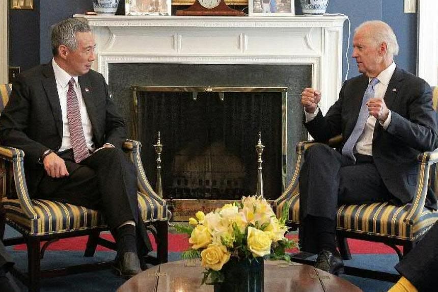 Singapore Prime Minister Lee Hsien Loong meets with United States Vice-President Joe Biden at his office in the White House, Washington DC, USA, on June 25, 2014. -- ST PHOTO: NEO XIAOBIN