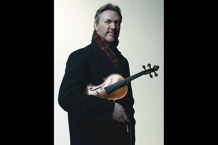 Violinist Mark O’Connor will play with the Singapore Chinese Orchestra three of his own compositions which will be adapted for Chinese instruments. -- PHOTO: SINGAPORE CHINESE ORCHESTRA