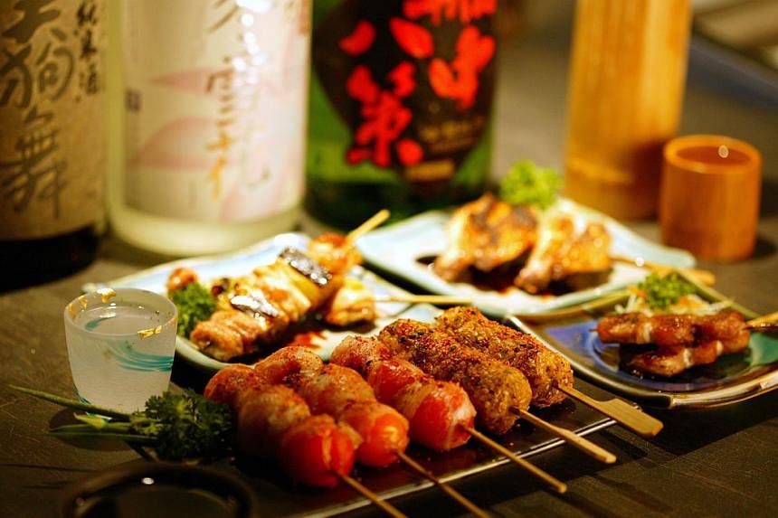 Range of sumiyaki or grilled items on skewers, from beef short rib to gingko nuts.. -- PHOTO: SHUNJUU RESTAURANT