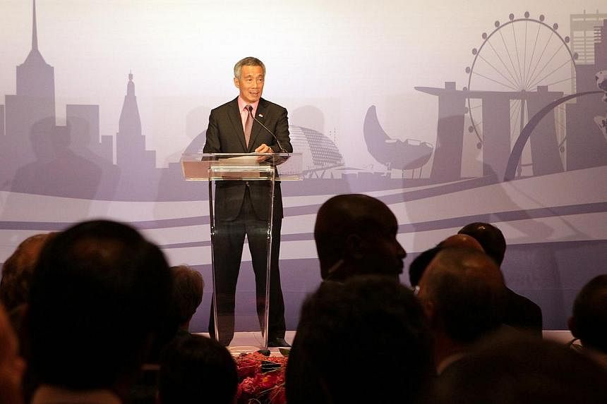 Singapore Prime Minister Lee Hsien Loong addresses the audience at the launch of the Temasek Holdings New York office launch at the Waldorf Astoria New York Hotel, in New York City, on Jun 26, 2014. --STPHOTO: NEO XIAOBIN