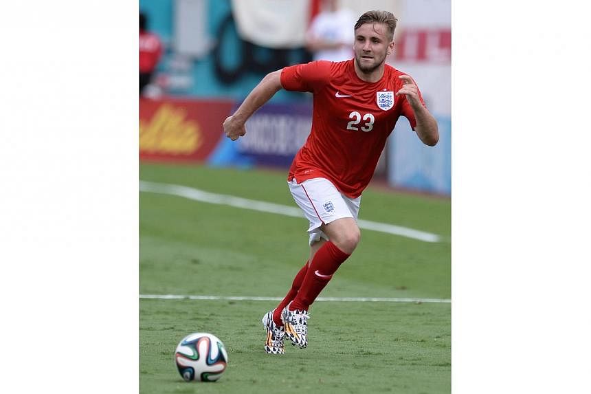 England defender Luke Shaw kicks the ball during the friendly match between England and Ecuador at Miami Sun Life Stadium in Miami Gardens, Florida on June 4, 2014. Shaw proclaimed himself to be a Manchester United player on Friday, in apparent confi