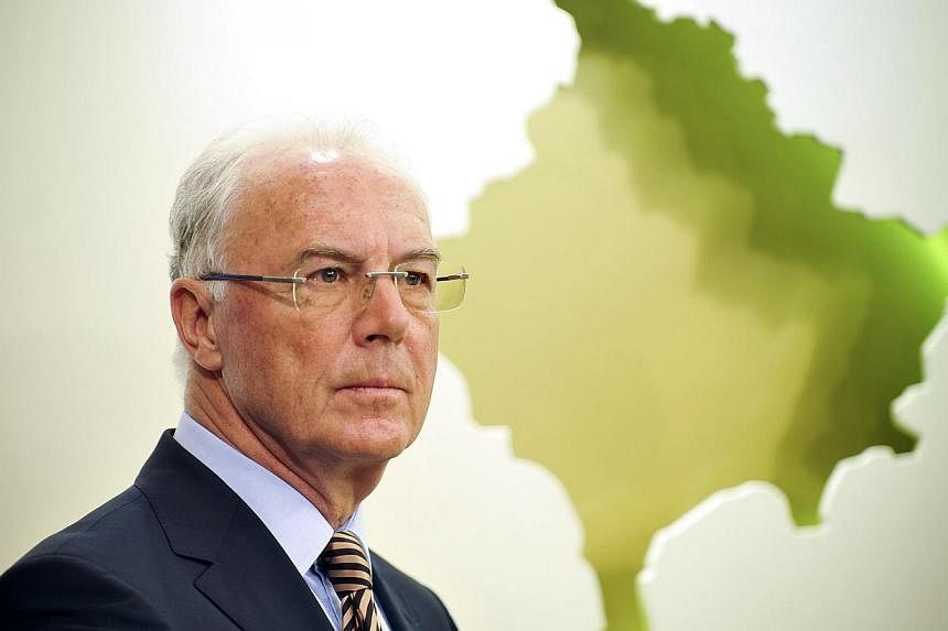 A file picture taken in Pristina on March 4, 2011, shows German football legend and FIFA executive committee member Franz Beckenbauer giving a press conference.&nbsp;German legend Franz Beckenbauer has had his 90-day ban from any football-related act