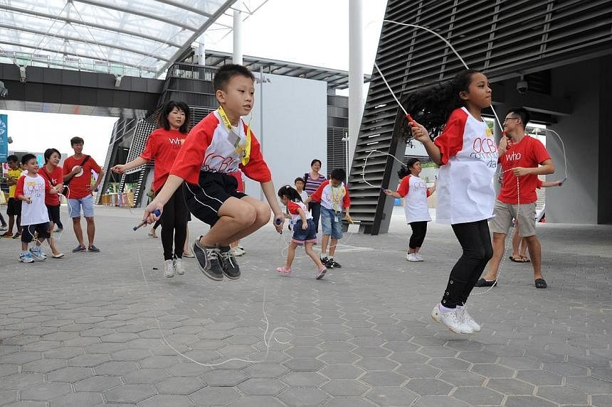 Thousands showed up the Sports Hub in Kallang on Saturday - the first weekend that the brand new $1.3 billion sporting arena opened its doors to the public. -- PHOTO: OCBC&nbsp;