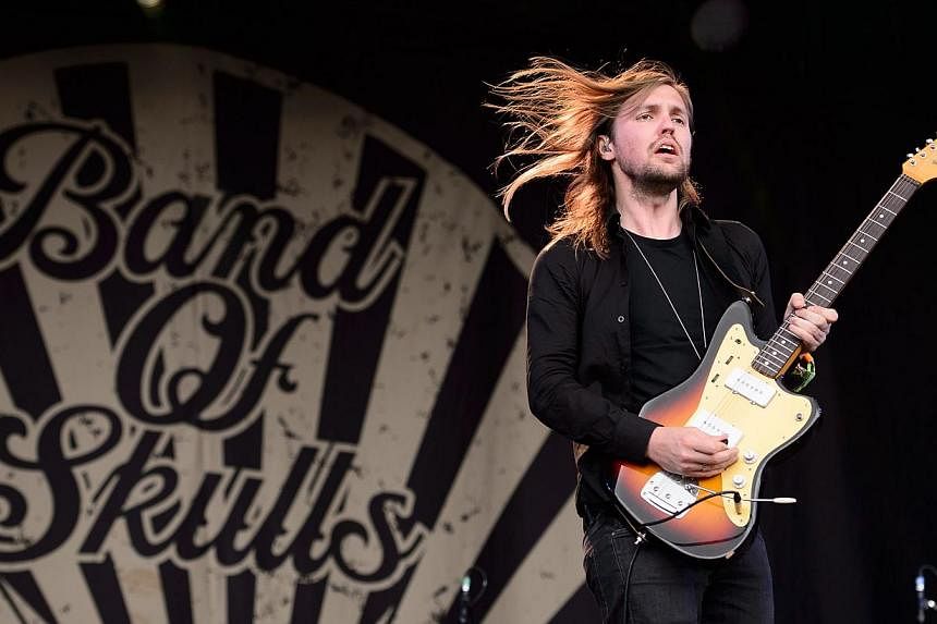 Russell Marsden, guitarist and singer from British band Band Of Skulls, performs on the Other Stage, on the first official day of the Glastonbury Festival of Music and Performing Arts in Somerset, south-west England, on June 27, 2014. -- PHOTO: AFP