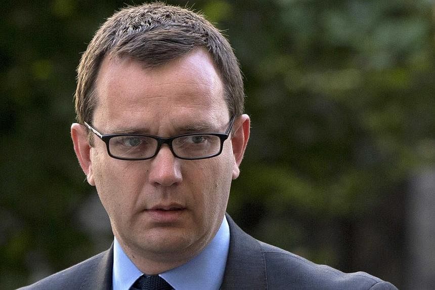 Andy Coulson (above), ex-media chief of British Prime Minister David Cameron, will face a re-trial over whether he sanctioned illegal payments to a public official while editing a Rupert Murdoch tabloid, prosecutors said on June 30, 2014. -- PHOTO: R